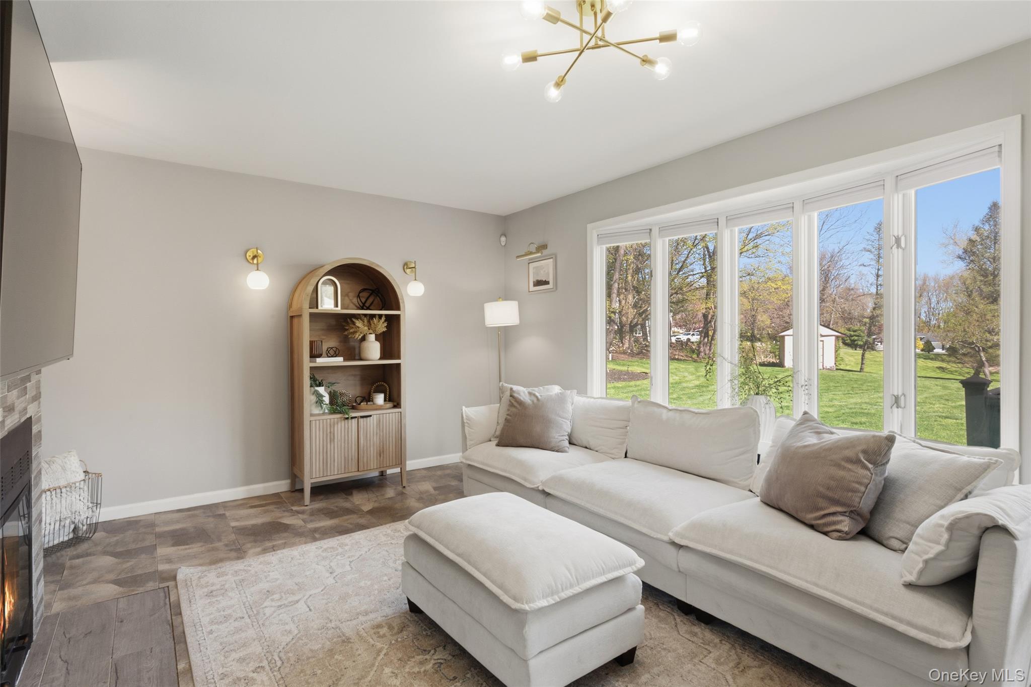 130 Cobb Road Brewster, NY 10509 - Photo 24 of 48 Comfortable family room with a fireplace, creating a seamless flow for modern living