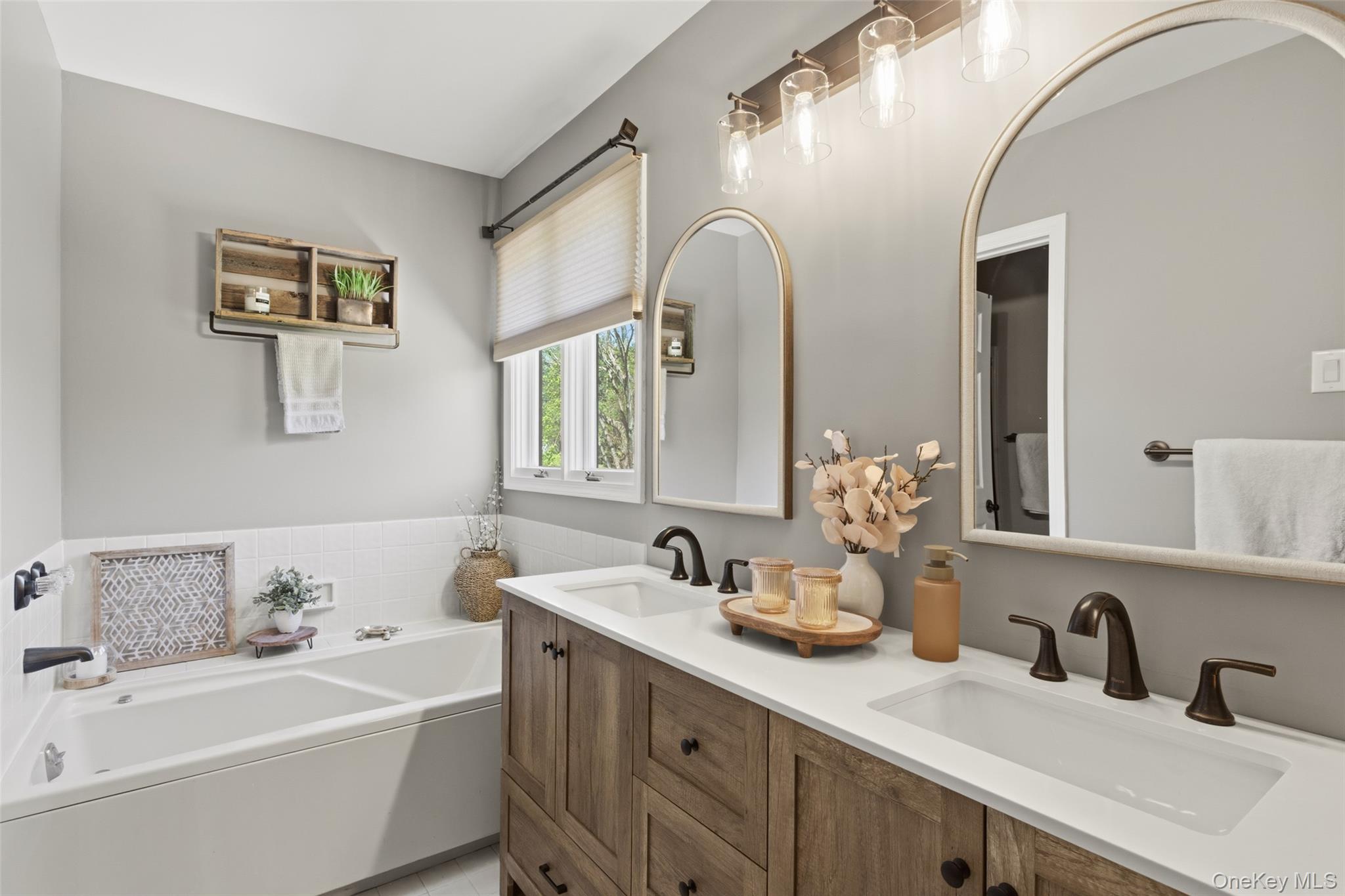 130 Cobb Road Brewster, NY 10509 - Photo 30 of 48 private bath with double vanity and whirlpool tub, along with a separate room that includes both the shower and toilet for added privacy.