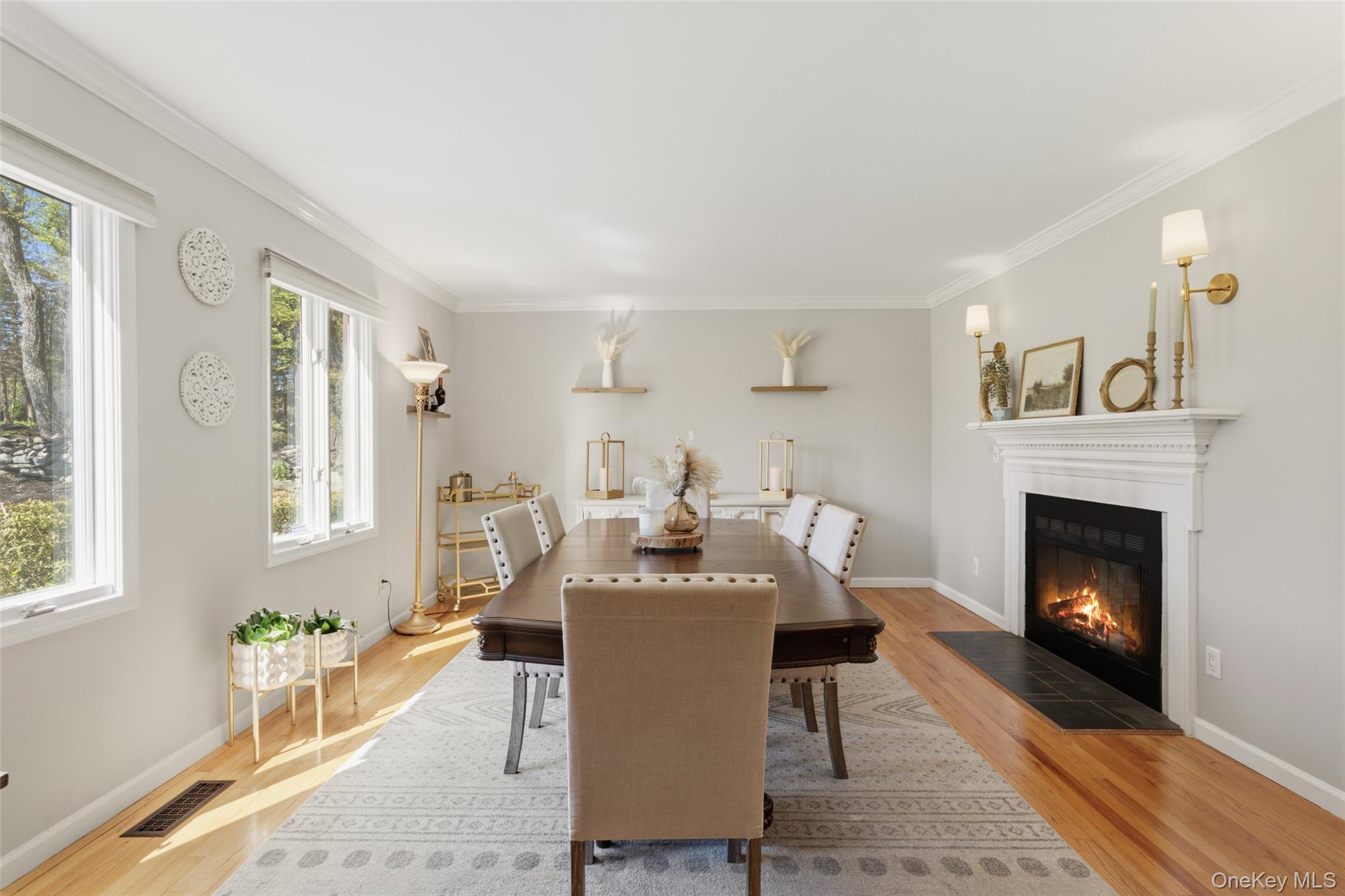 130 Cobb Road Brewster, NY 10509 - Photo 9 of 48 extra-large dining room offers the perfect setting for gatherings, highlighted by a stunning double-sided wood-burning fireplace
