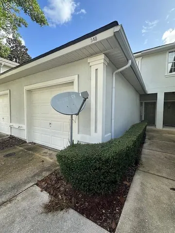a view of a back yard of the house