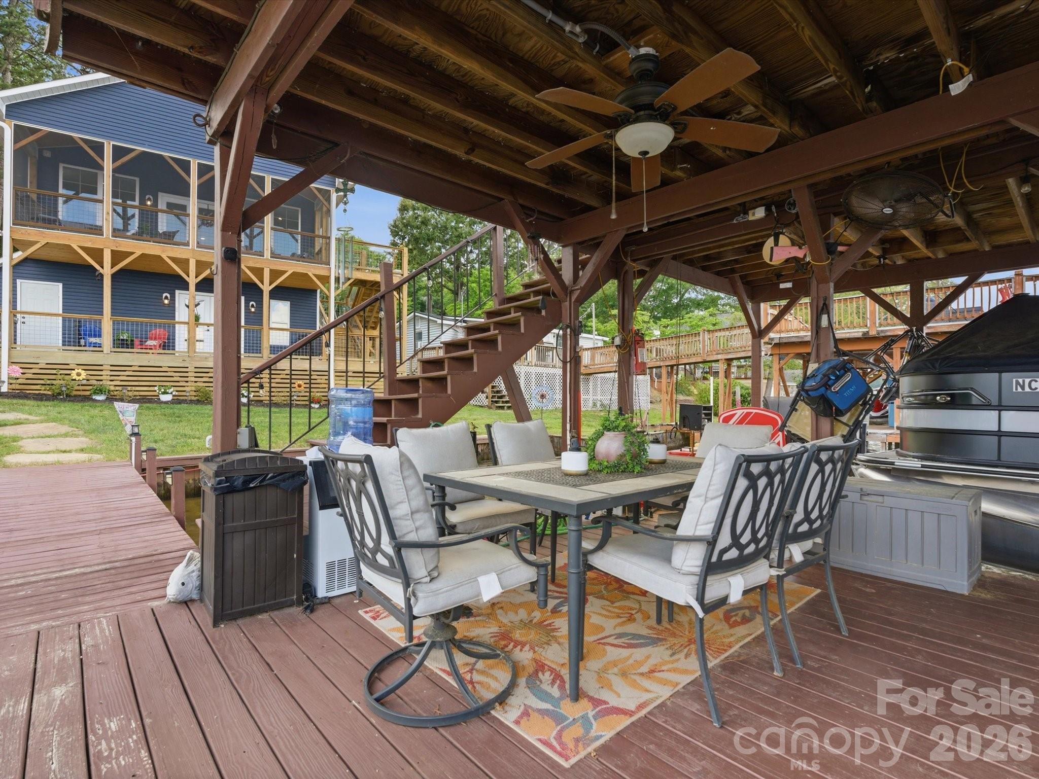 562 Lake Head Road Norwood, NC 28128 - Photo 37 of 43 a view of an outdoor sitting area with furniture and garden view
