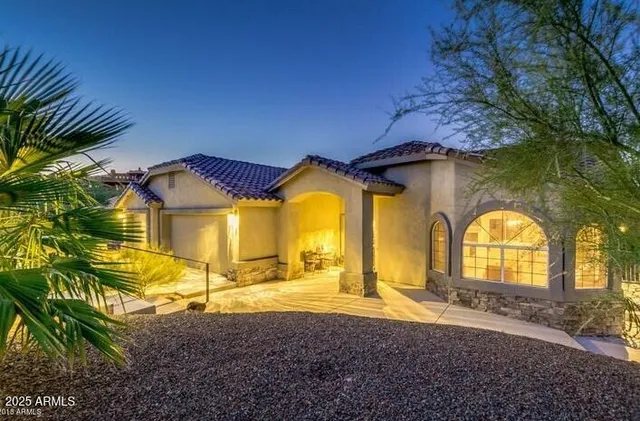 a view of a house with a yard