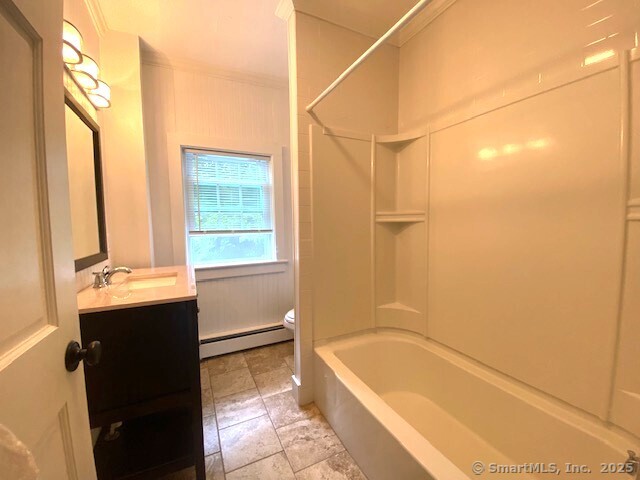623 Elm Street Monroe, CT 06468 - Photo 21 of 22 a bathroom with a bathtub and shower