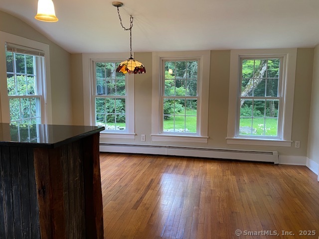 623 Elm Street Monroe, CT 06468 - Photo 8 of 22 a view of a livingroom with wooden floor and a window