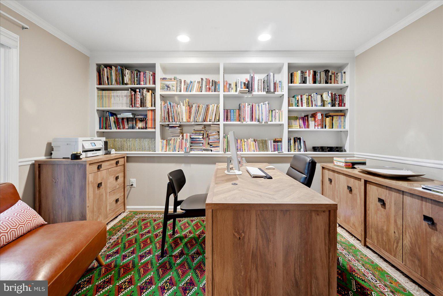 911 Riva Ridge Drive Great Falls, VA 22066 - Photo 8 of 55 Cozy home office with vibrant decor.