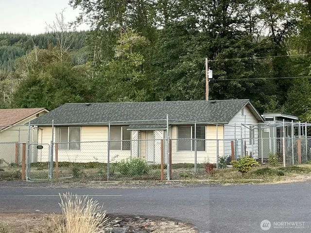 a view of a backyard of a house
