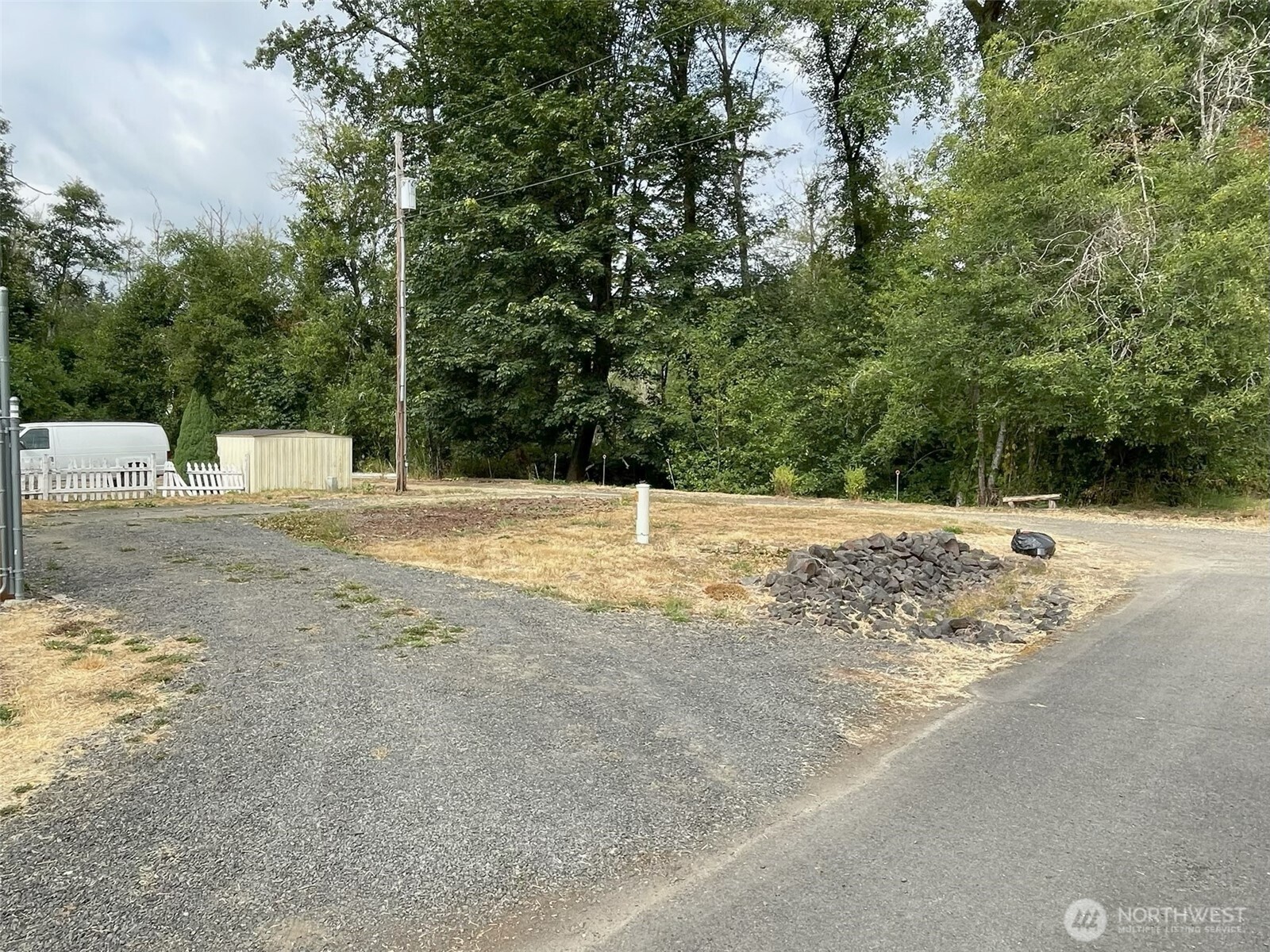 200 Madison Street Ryderwood, WA 98581 - Photo 15 of 26 a view of a backyard of a house