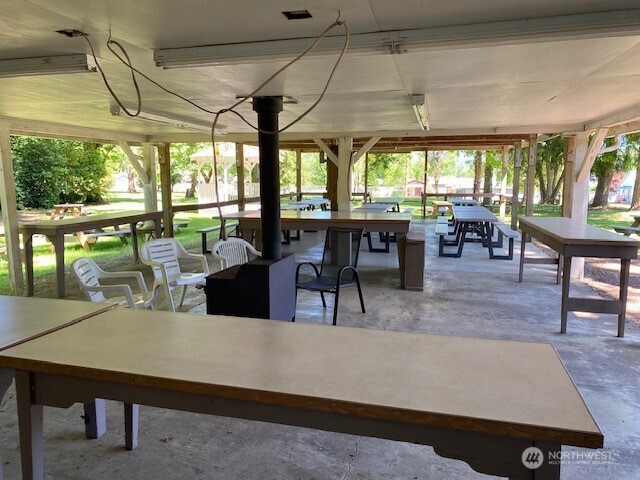 200 Madison Street Ryderwood, WA 98581 - Photo 21 of 26 a view of a dining room with furniture window and outside view