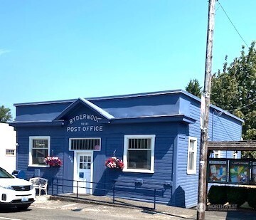 200 Madison Street Ryderwood, WA 98581 - Photo 23 of 26 a front view of a house with parking