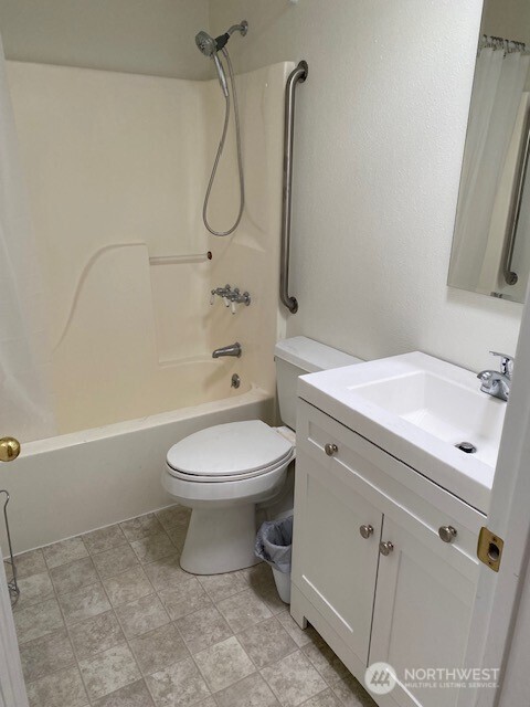 200 Madison Street Ryderwood, WA 98581 - Photo 9 of 26 a bathroom with a sink a toilet and shower