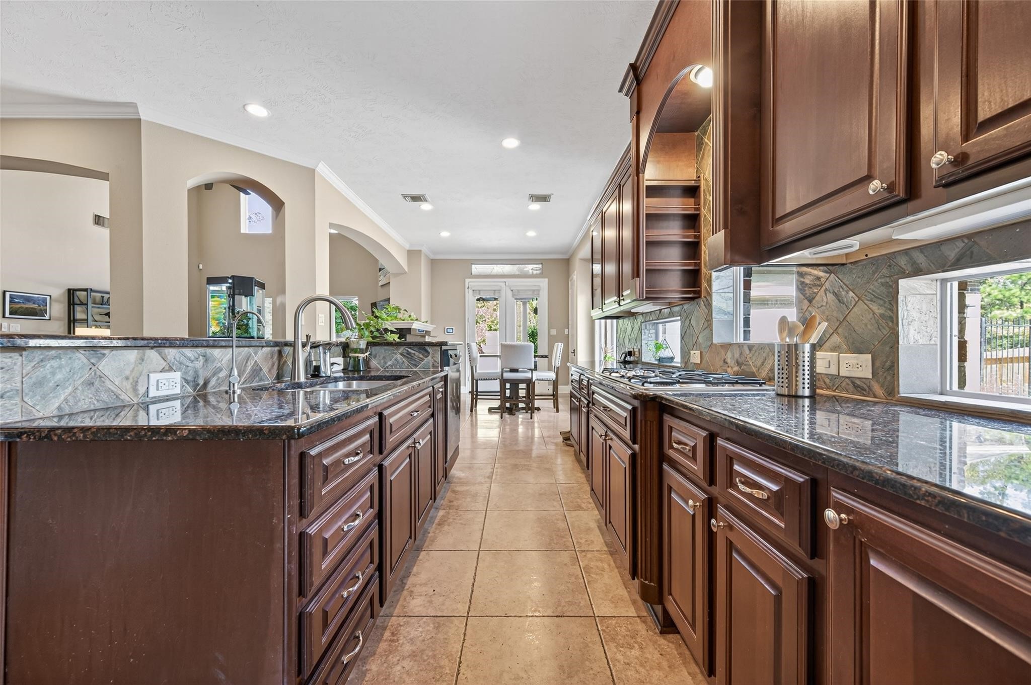 2007 Cliff Manor Drive Conroe, TX 77304 - Photo 12 of 35 a kitchen with counter top space and windows