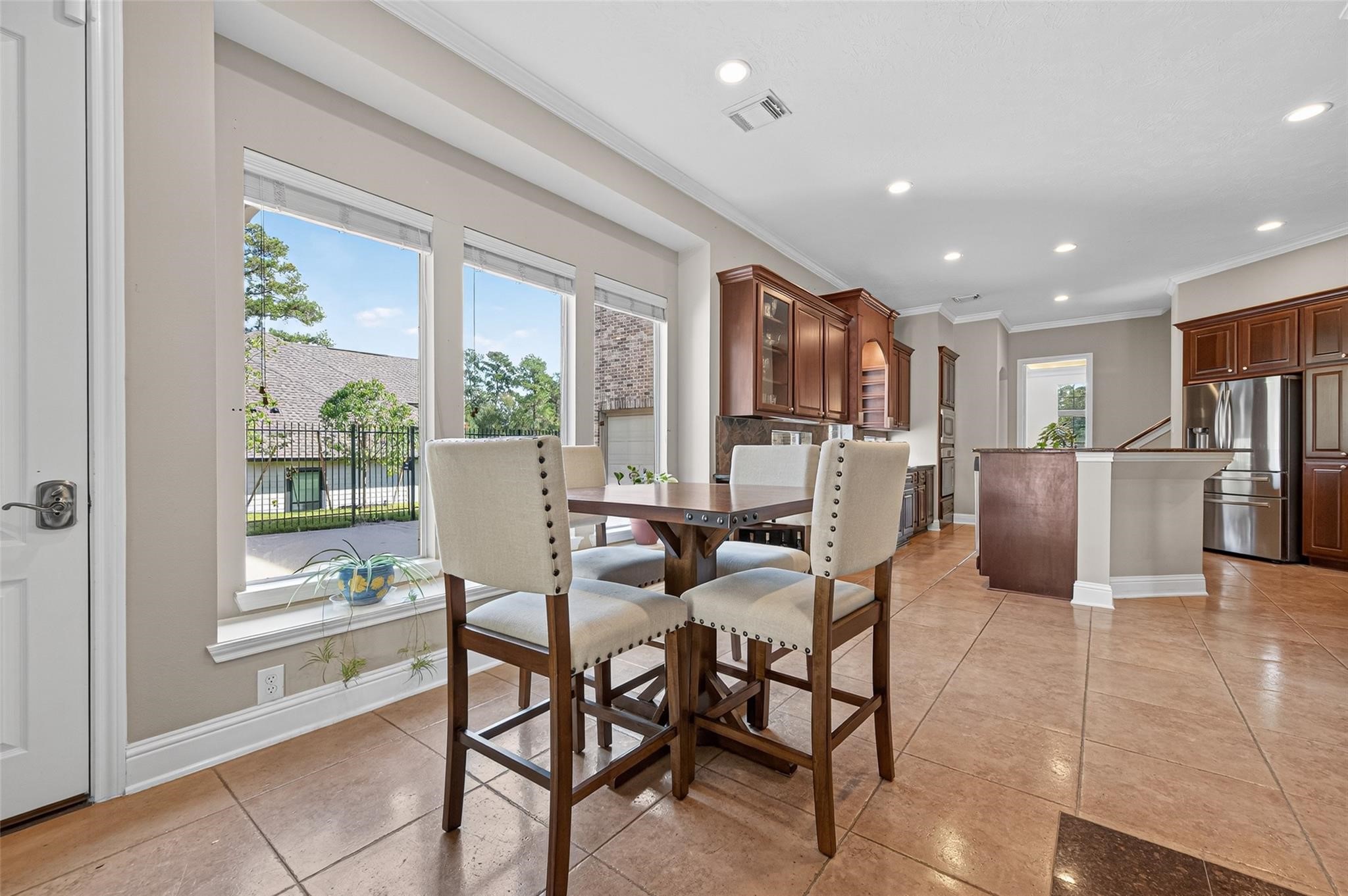 2007 Cliff Manor Drive Conroe, TX 77304 - Photo 14 of 35 a view of a dining room with furniture large window and outside view