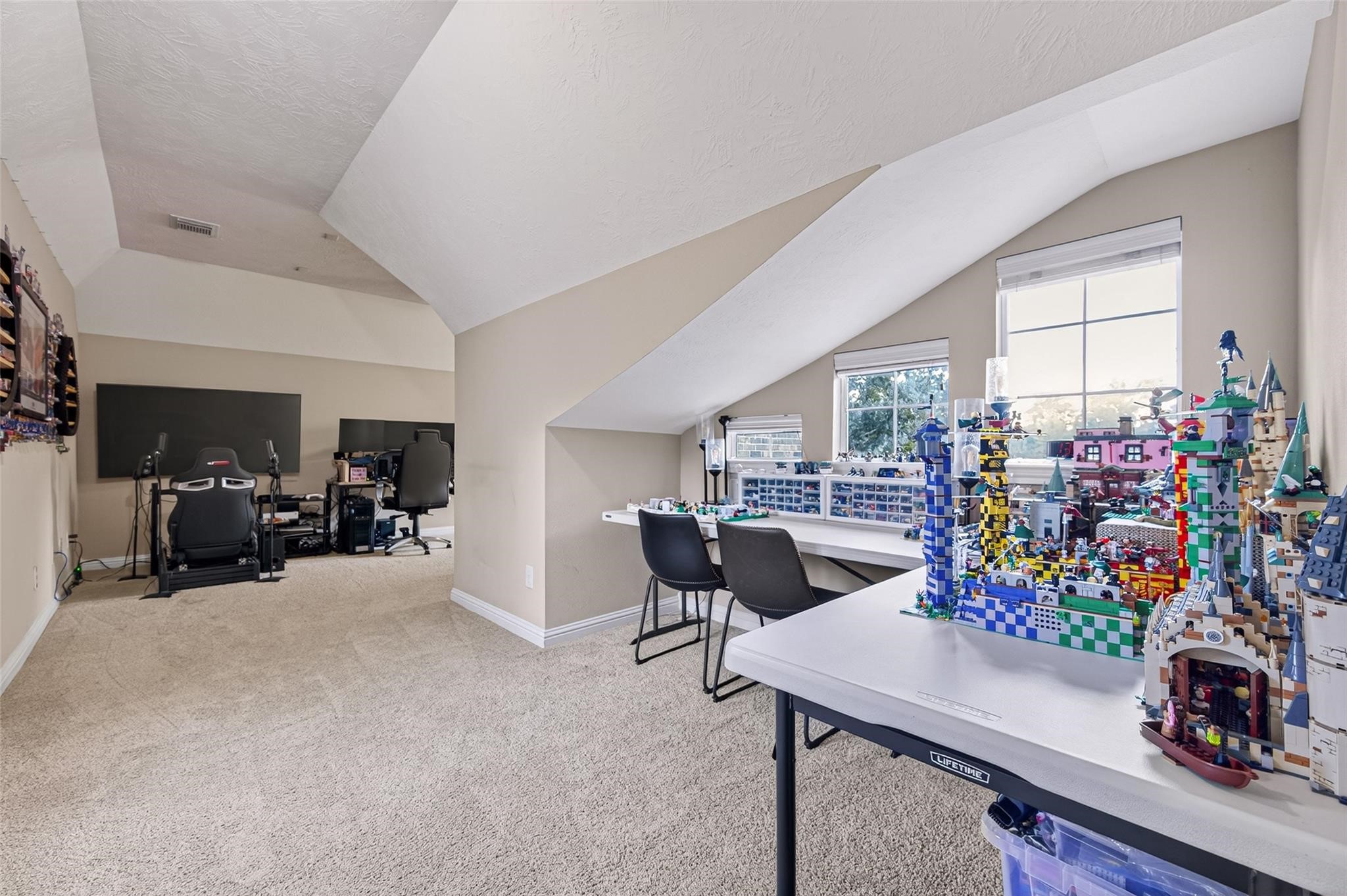2007 Cliff Manor Drive Conroe, TX 77304 - Photo 21 of 35 a very nice looking room with a large window and couch