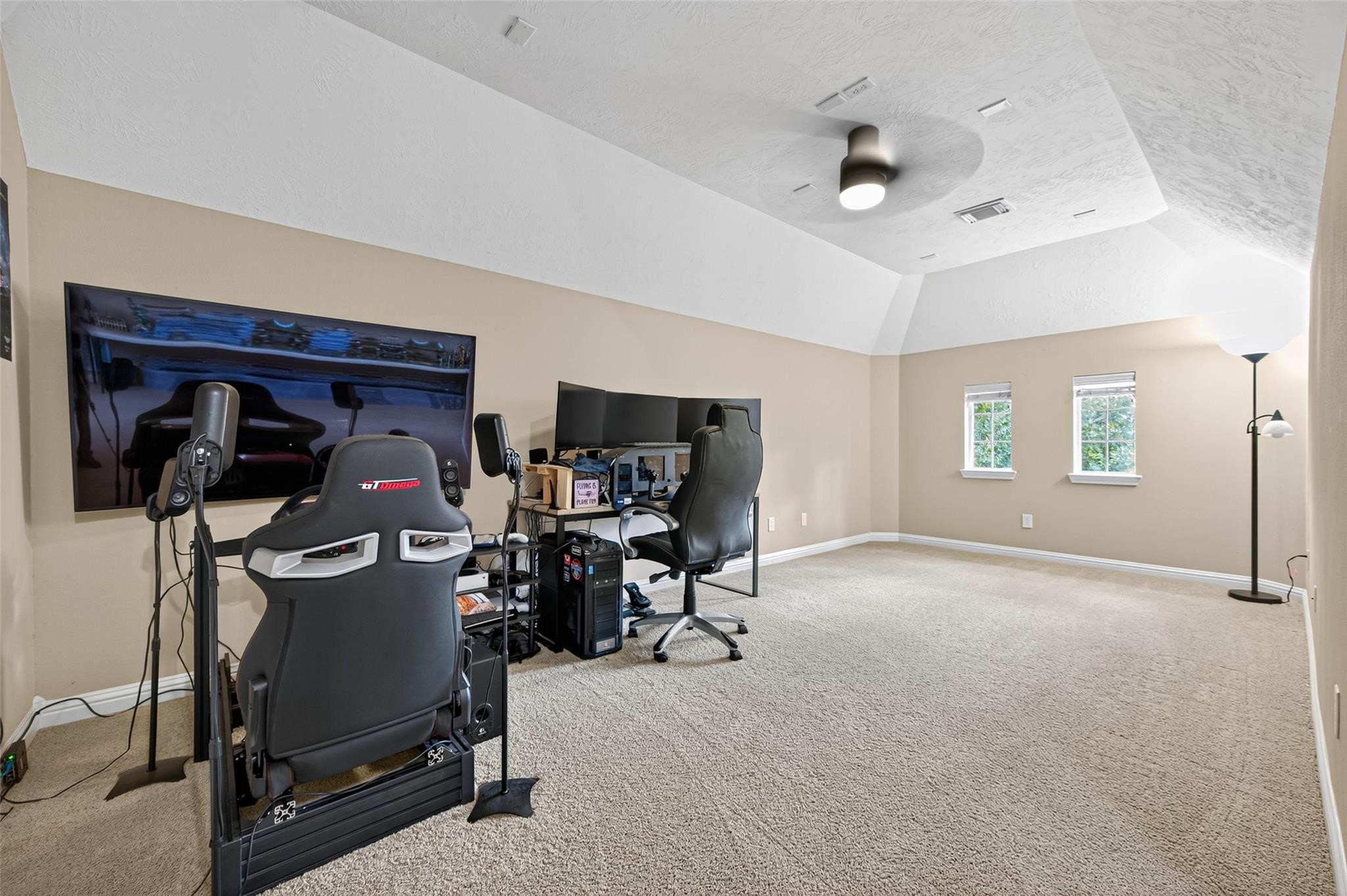 2007 Cliff Manor Drive Conroe, TX 77304 - Photo 28 of 35 a view of a room with gym equipment