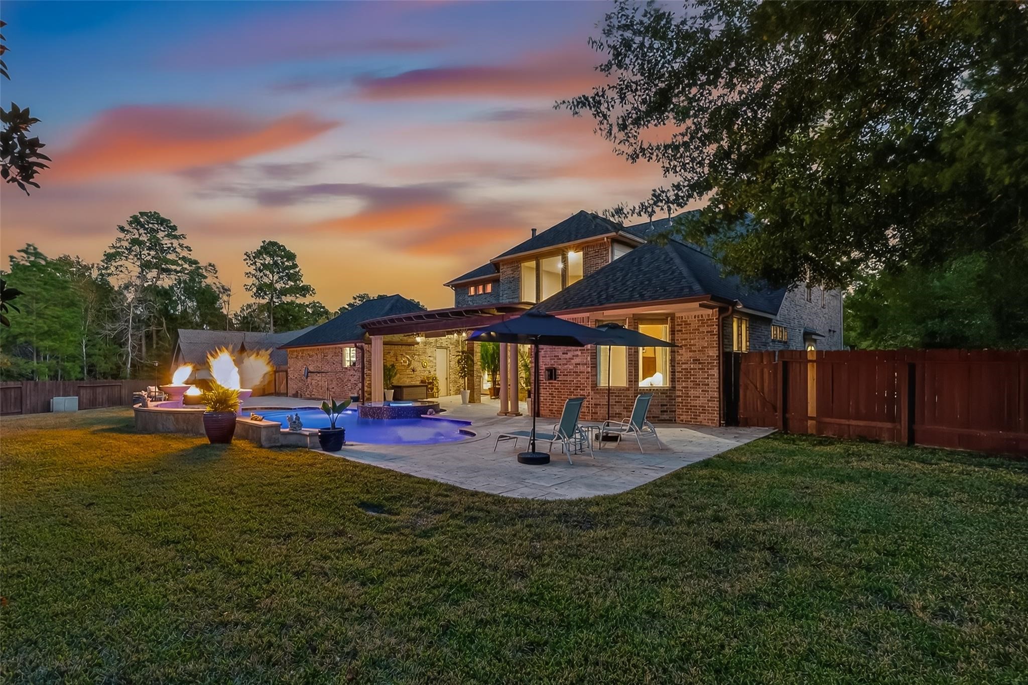 2007 Cliff Manor Drive Conroe, TX 77304 - Photo 29 of 35 a view of a house with backyard porch and sitting area