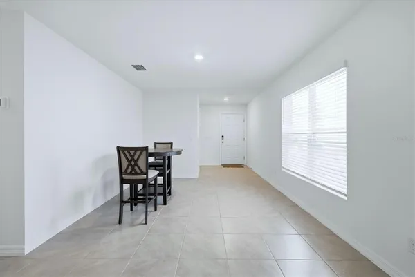 a view of a room with table and chair