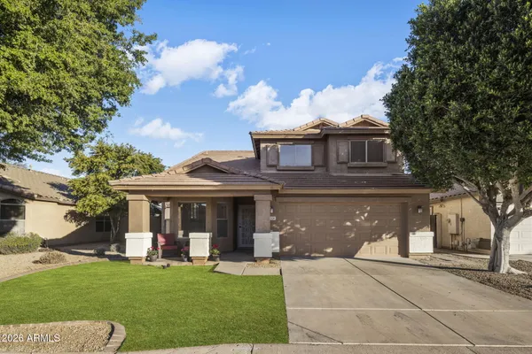 front view of a house with a yard
