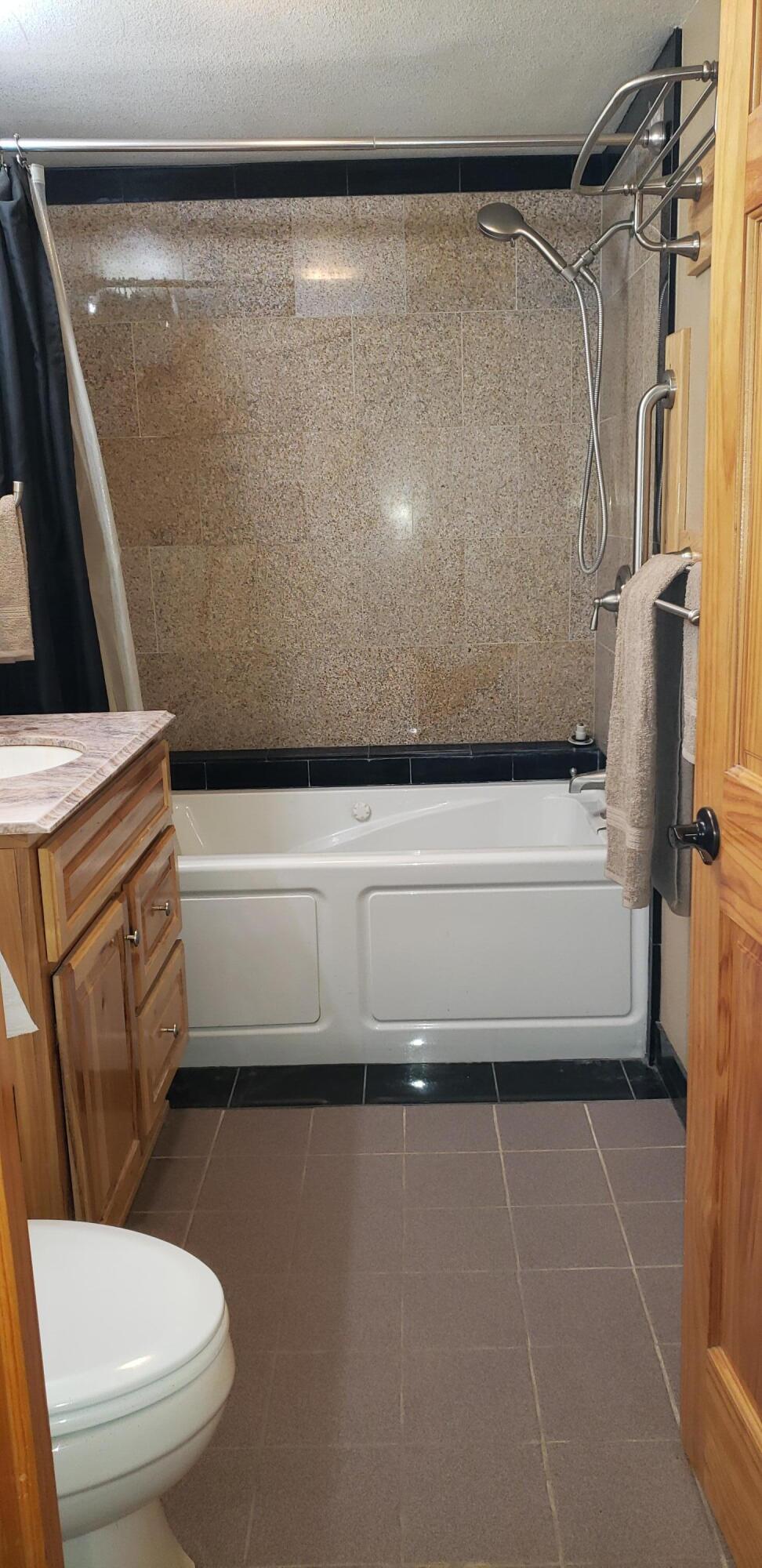 132860 Highway 97 Crescent, OR 97733 - Photo 13 of 25 a bathroom with a toilet a sink and a shower