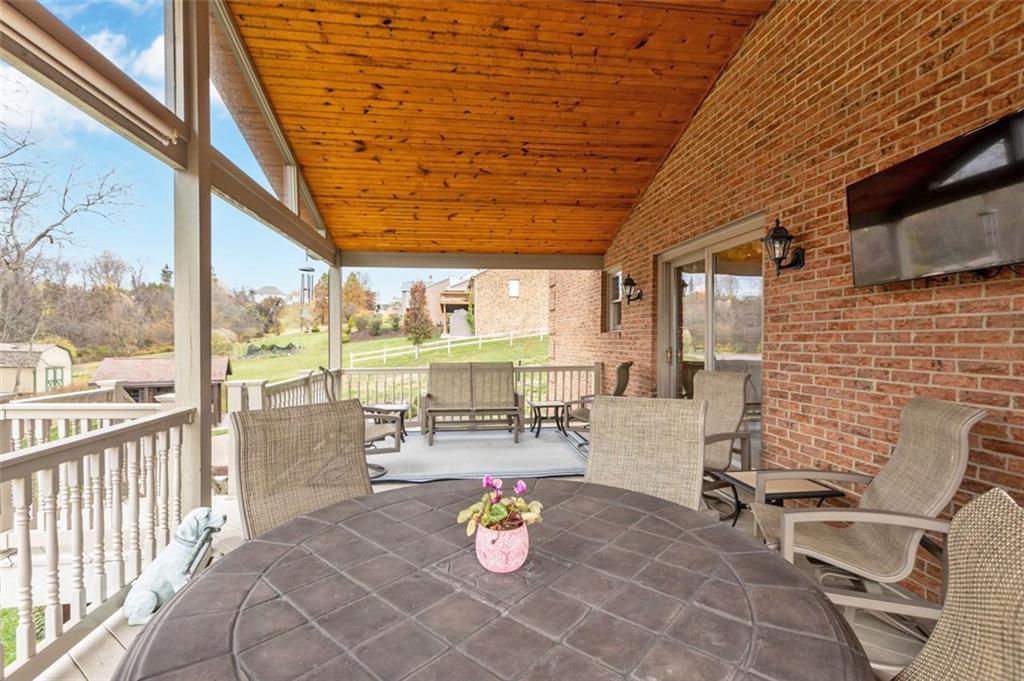 156 Revo Road Pittsburgh, PA 15236 - Photo 11 of 28 The covered deck is the perfect vantage point for enjoying nature!