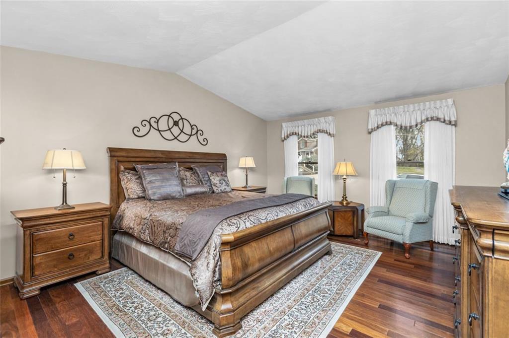 156 Revo Road Pittsburgh, PA 15236 - Photo 18 of 28 The luxury Master Suite has a cathedral ceiling, hardwood flooring and plenty of wall space for your furniture!
