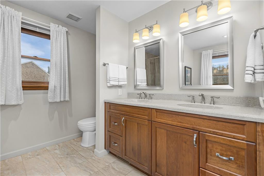 156 Revo Road Pittsburgh, PA 15236 - Photo 21 of 28 The Master Suite bath has a double vanity with his and her sinks to make life a little easier...