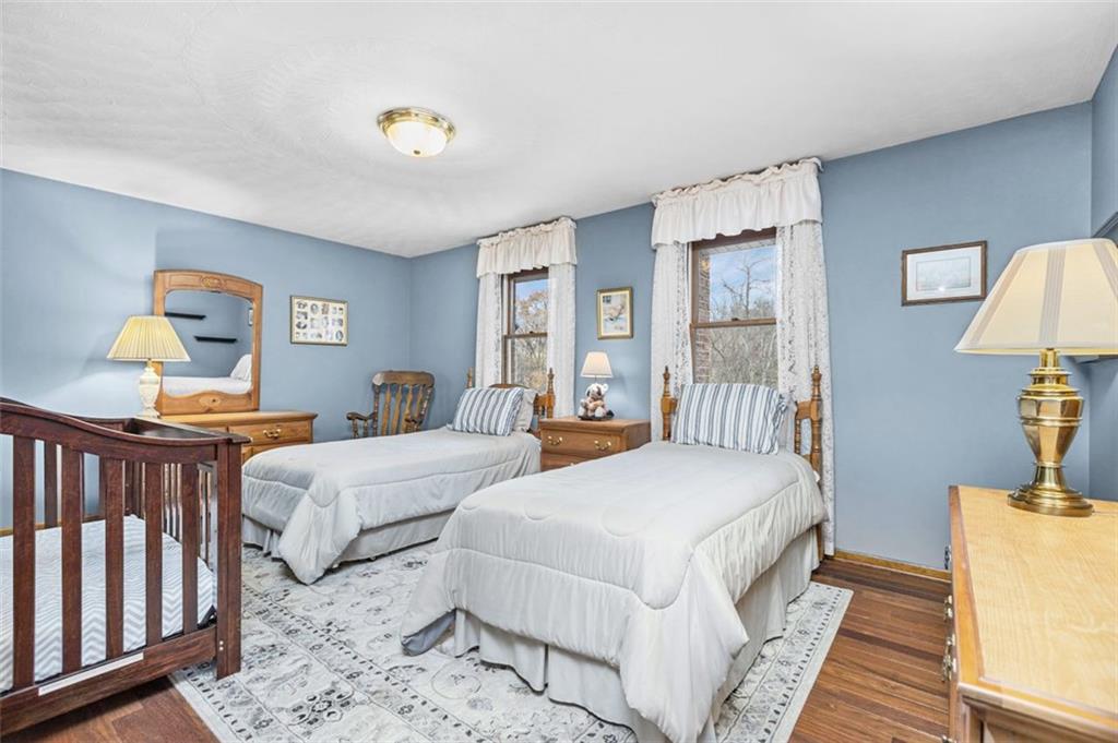 156 Revo Road Pittsburgh, PA 15236 - Photo 22 of 28 Spacious bedroom 2 has hardwood flooring, overhead lighting and a large double closet...