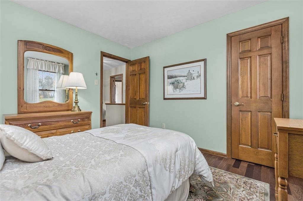 156 Revo Road Pittsburgh, PA 15236 - Photo 25 of 28 Bedroom 4 with overhead lighting, hardwood flooring...