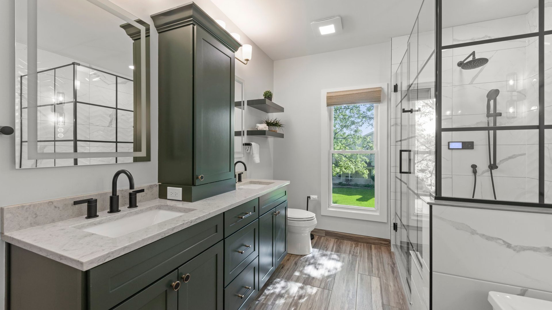 3614 Wolf Road Oswego, IL 60543 - Photo 31 of 56 a bathroom with a granite countertop sink and a mirror