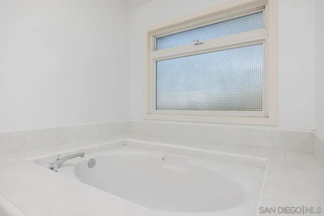 a bathroom with a bathtub