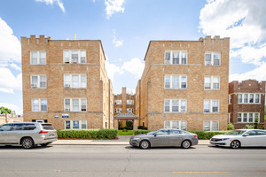 5423 West Montrose Avenue, Unit N3 Chicago, IL 60641 - Photo 1 of 10 a cars parked in front of a building