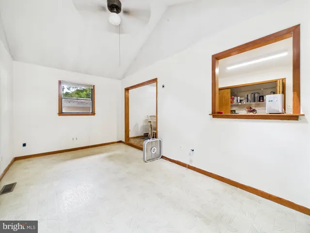 an empty room with windows