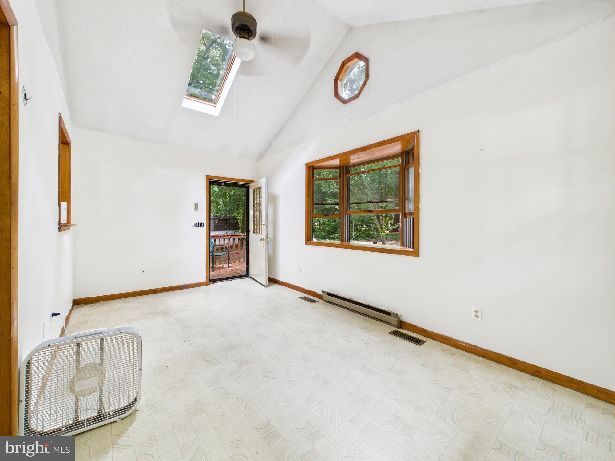 22915 Angola Road West Lewes, DE 19958 - Photo 14 of 32 an empty room with windows