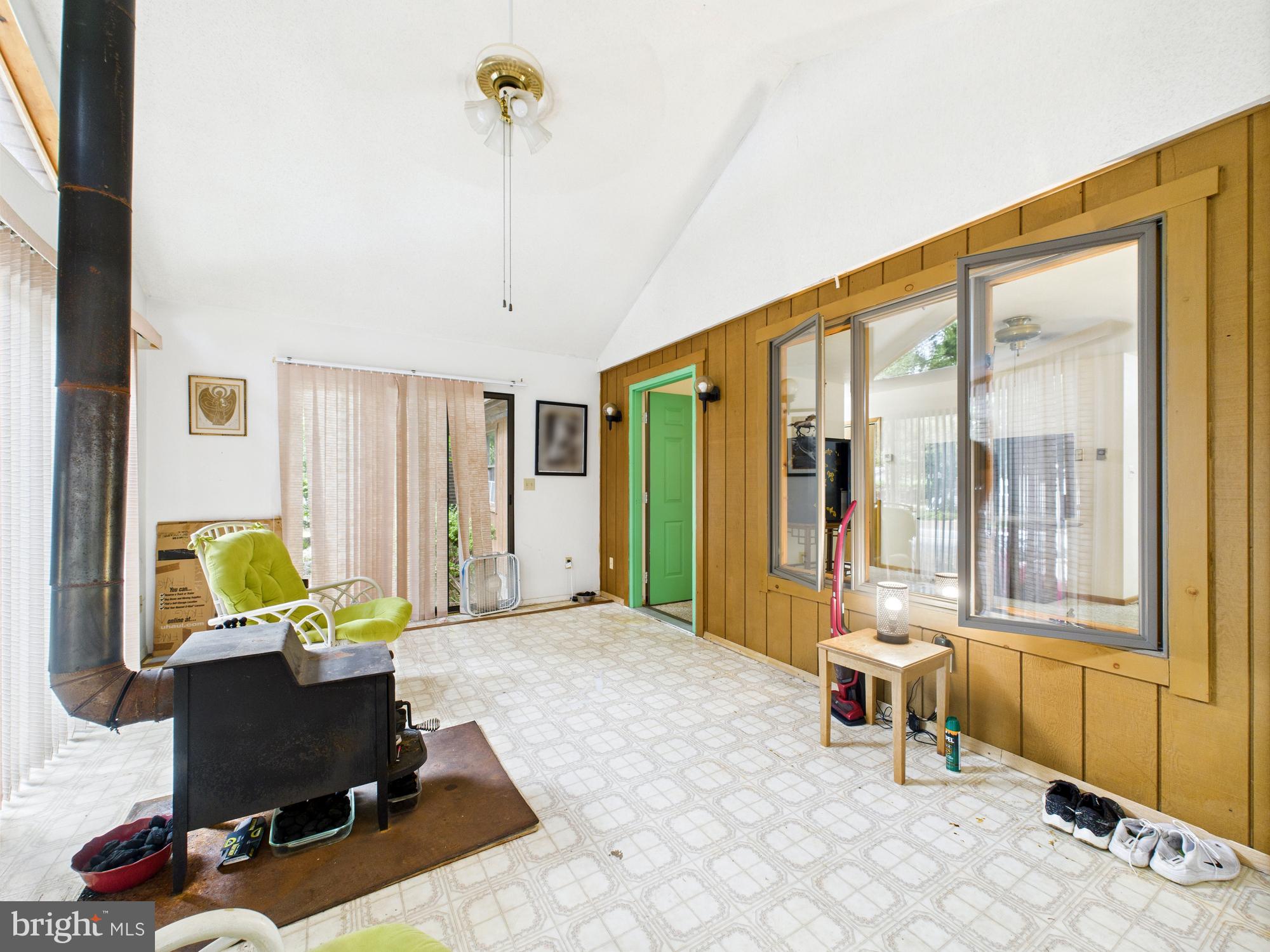 22915 Angola Road West Lewes, DE 19958 - Photo 4 of 32 a living room with furniture and next to a window