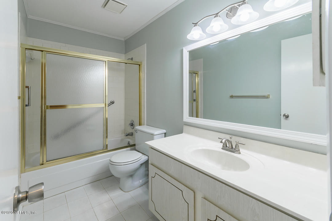 2233 Seminole Road, Unit 30 Atlantic Beach, FL 32233 - Photo 21 of 29 a bathroom with a sink toilet and shower