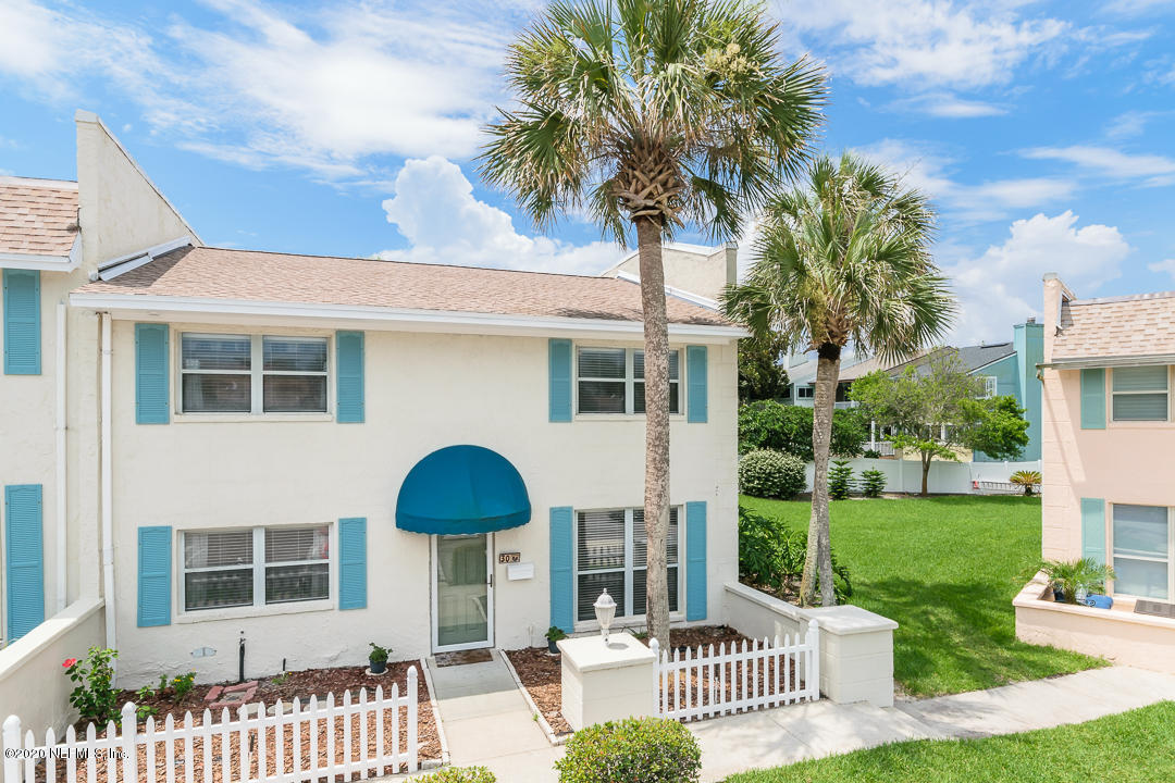 2233 Seminole Road, Unit 30 Atlantic Beach, FL 32233 - Photo 25 of 29 a front view of a house with a garden
