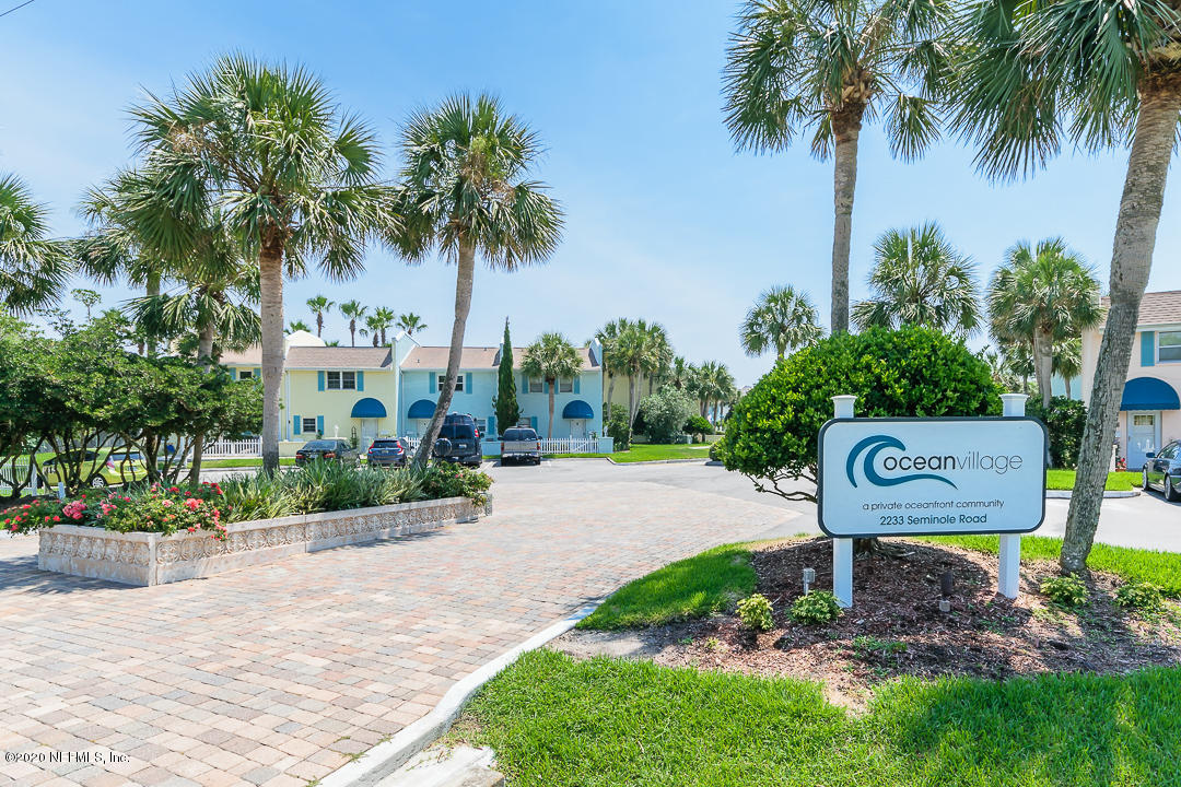 2233 Seminole Road, Unit 30 Atlantic Beach, FL 32233 - Photo 29 of 29 a house with a garden and trees
