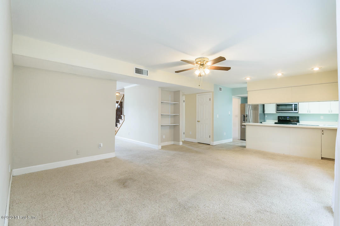 2233 Seminole Road, Unit 30 Atlantic Beach, FL 32233 - Photo 8 of 29 a view of an empty room with a kitchen