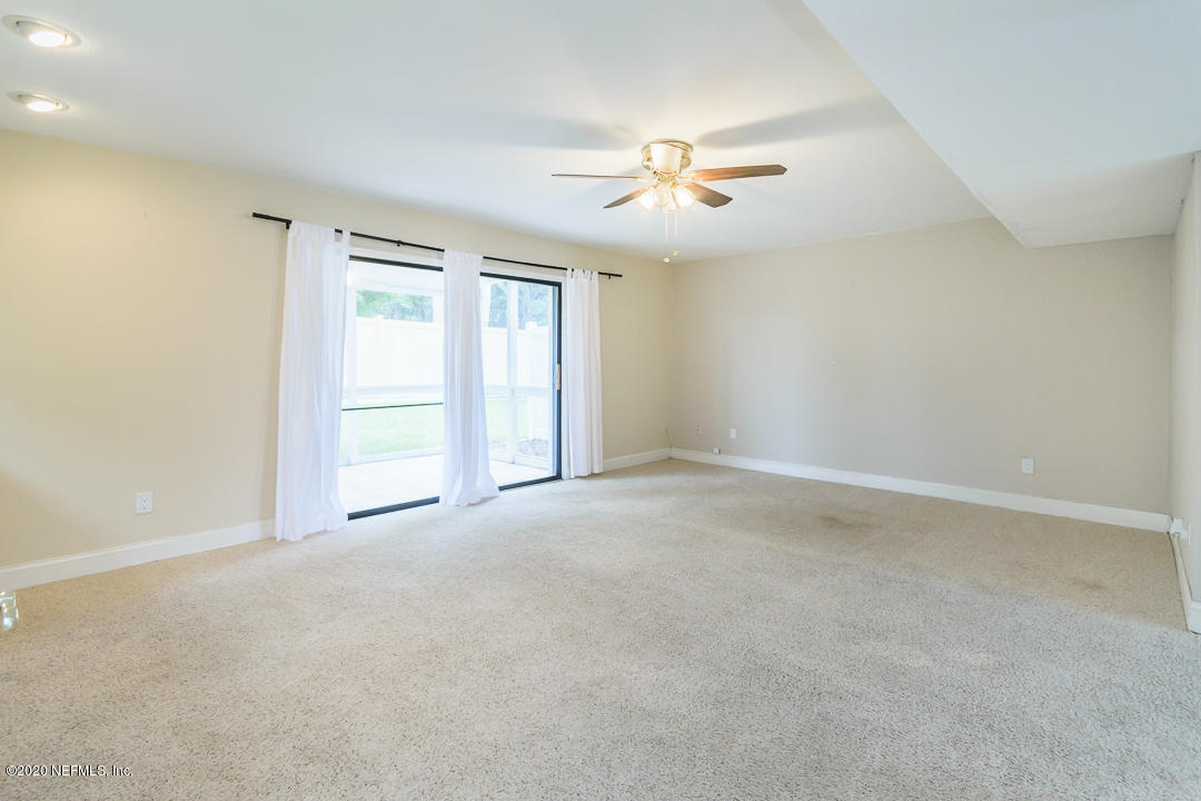 2233 Seminole Road, Unit 30 Atlantic Beach, FL 32233 - Photo 9 of 29 a view of an empty room with a window