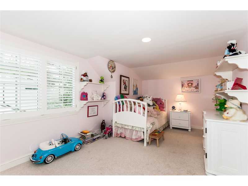 15 Old Stone Road Darien, CT 06820 - Photo 13 of 22 a bedroom with furniture and a bed