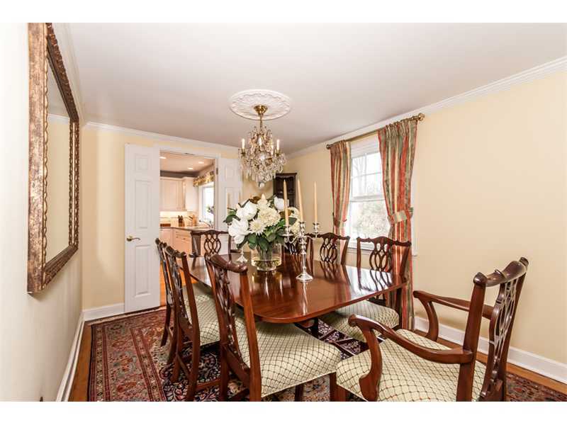 15 Old Stone Road Darien, CT 06820 - Photo 3 of 22 a view of a dining room with furniture and chandelier