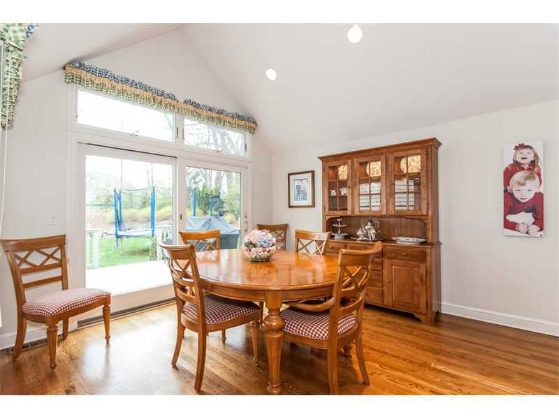 15 Old Stone Road Darien, CT 06820 - Photo 6 of 22 a view of a dining room with furniture and wooden floor