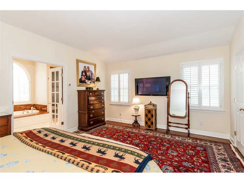 15 Old Stone Road Darien, CT 06820 - Photo 10 of 22 a living room with furniture and a flat screen tv