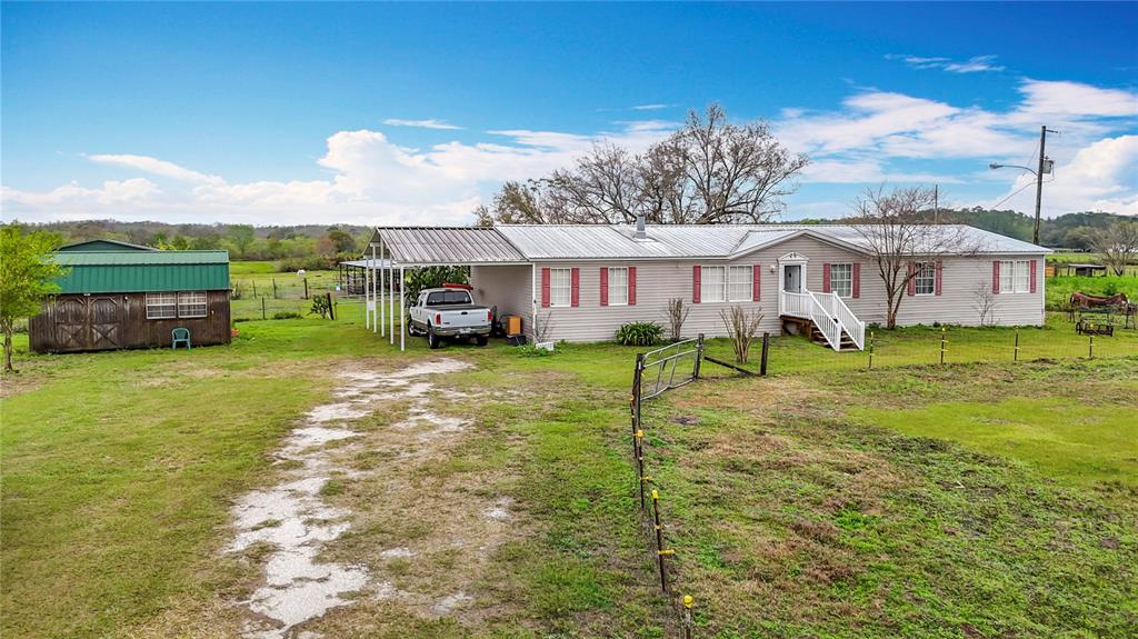 14220 O'Conner Road Kathleen, FL 33849 - Photo 1 of 1 a view of a house with a yard
