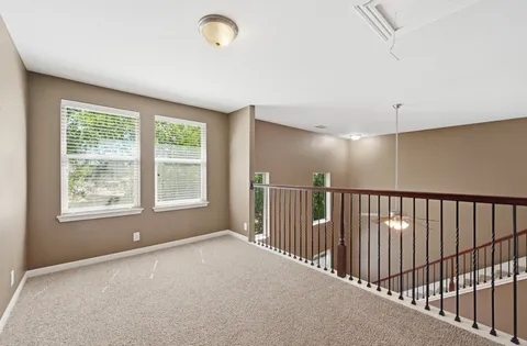 a view of a livingroom with a staircase