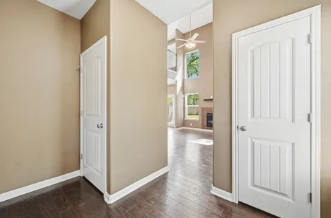a view of entryway with wooden floor