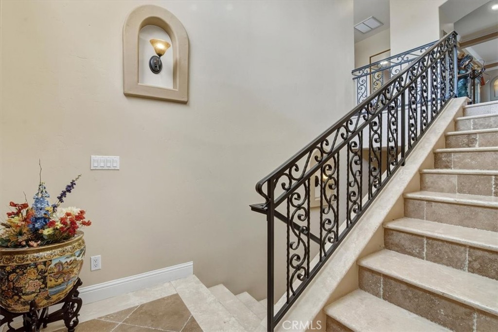 775 Riata Lane Nipomo, CA 93444 - Photo 17 of 48 Travertine entry steps with iron railings