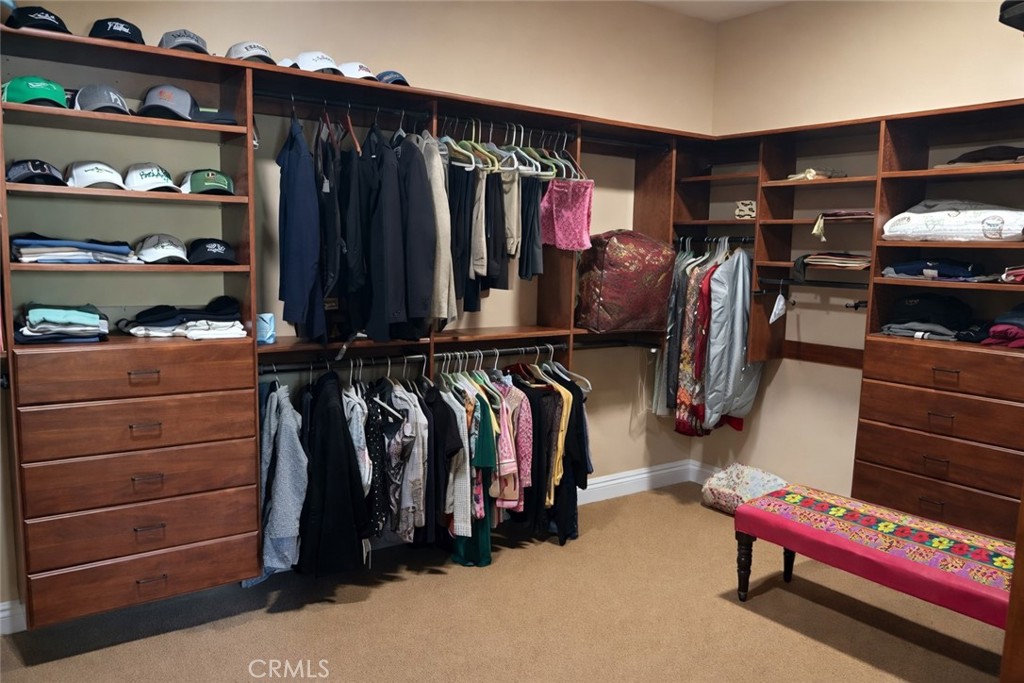 775 Riata Lane Nipomo, CA 93444 - Photo 20 of 40 a view of walk in closet with clothes and shoes