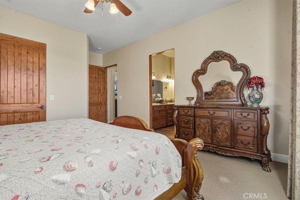 775 Riata Lane Nipomo, CA 93444 - Photo 24 of 48 a bedroom with a bed and a dresser