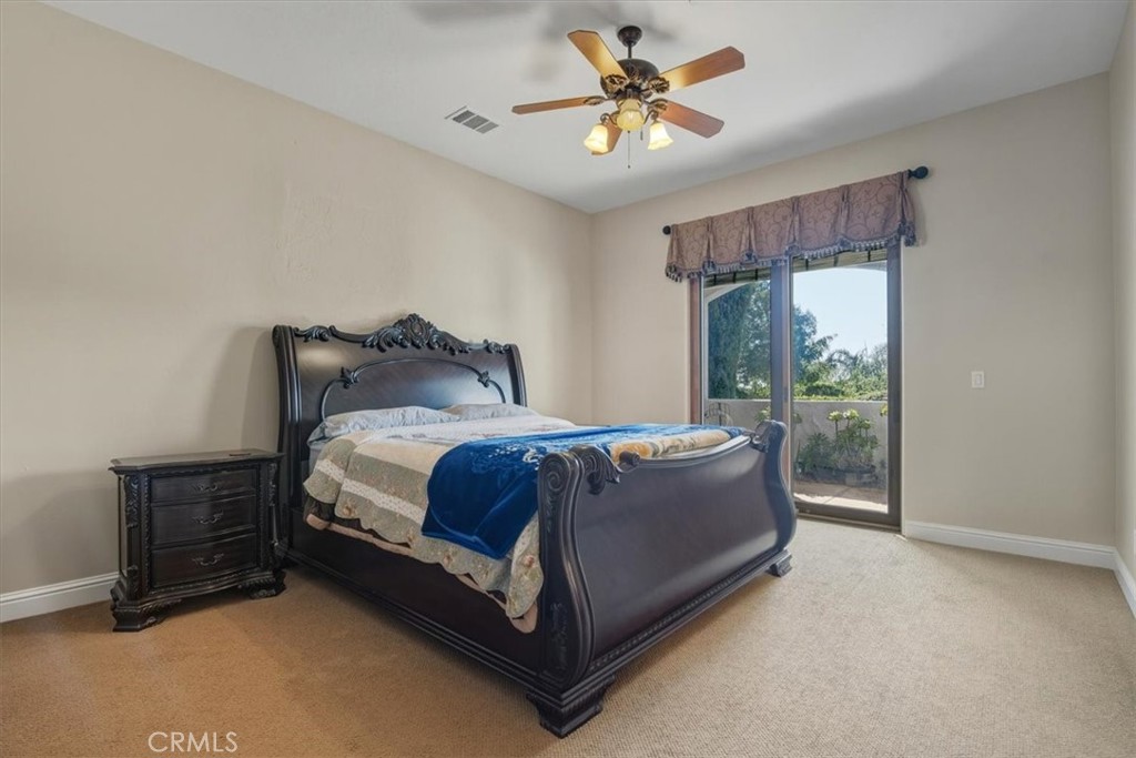 775 Riata Lane Nipomo, CA 93444 - Photo 27 of 48 a bedroom with a bed and a window