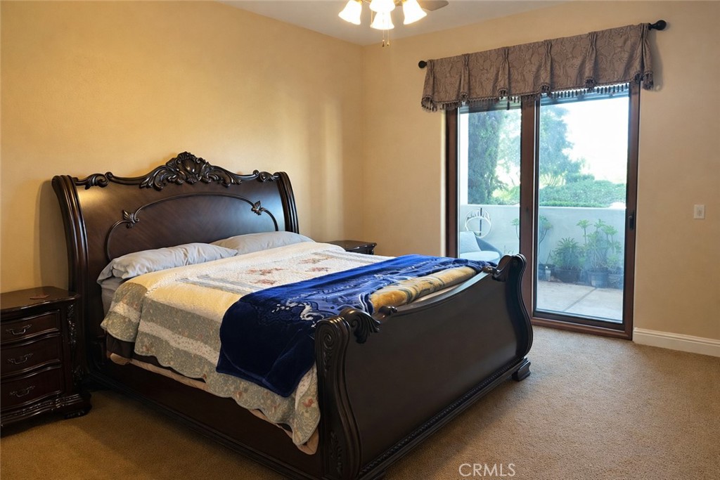 775 Riata Lane Nipomo, CA 93444 - Photo 32 of 40 a bed sitting in a bedroom next to a window